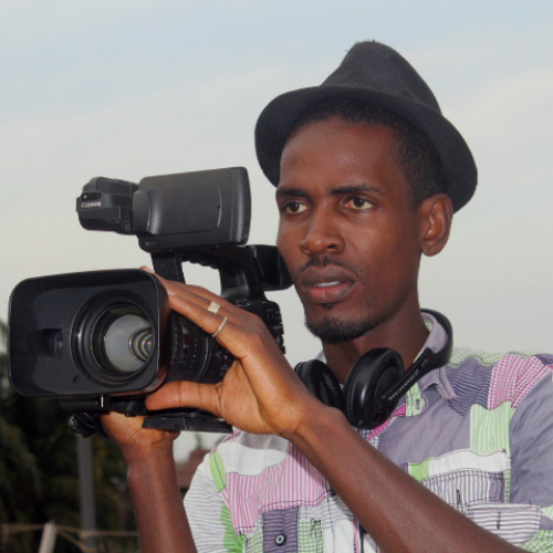 In the Shadow of Ebola filmmaker Alex with a camera.