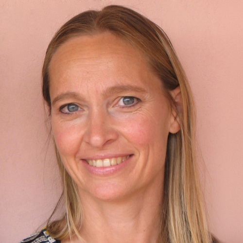 In the Shadow of Ebola director, Sarita, with a camera and mic.