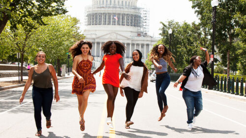  group photo of the cast taken by photographer Marc Baptiste in front of the U.S. Capitol 