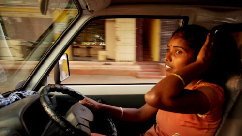 Indian woman taxi driver