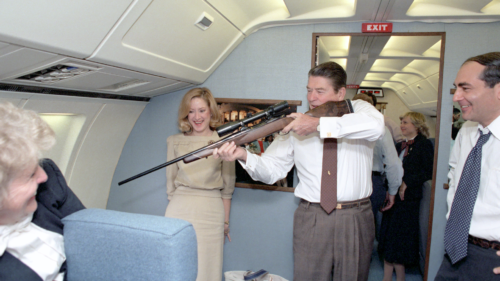 Airline staff holding riffle 
