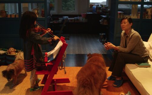 From My Tiger Mom: Debbie listens to daughter practicing violin