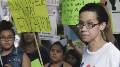 teacher and students protest National Teachers Academy