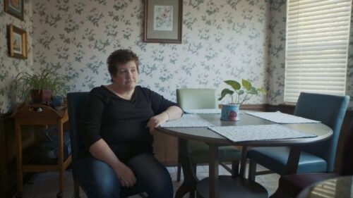 mother of incarcerated woman waiting for her phone call