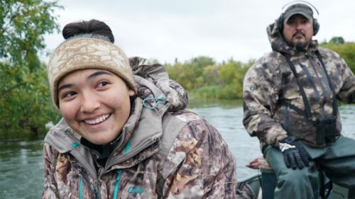 Jewel Wilson on boat with her father