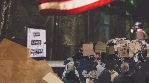 Protestors at the footsteps of a building 