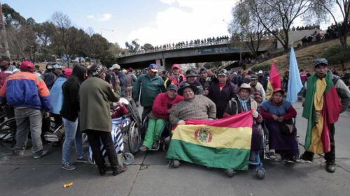 Group of people holding flag