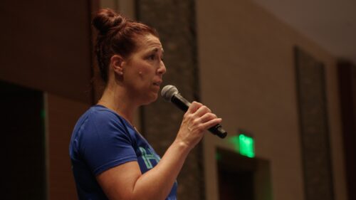 woman speaking into mic