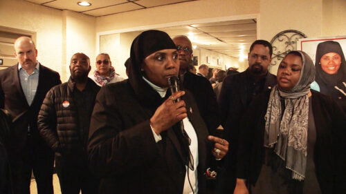 Woman speaking with microphone 