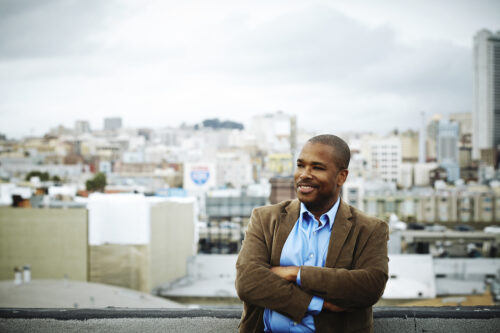 Noland Walker headshot with San Francisco skyline in background