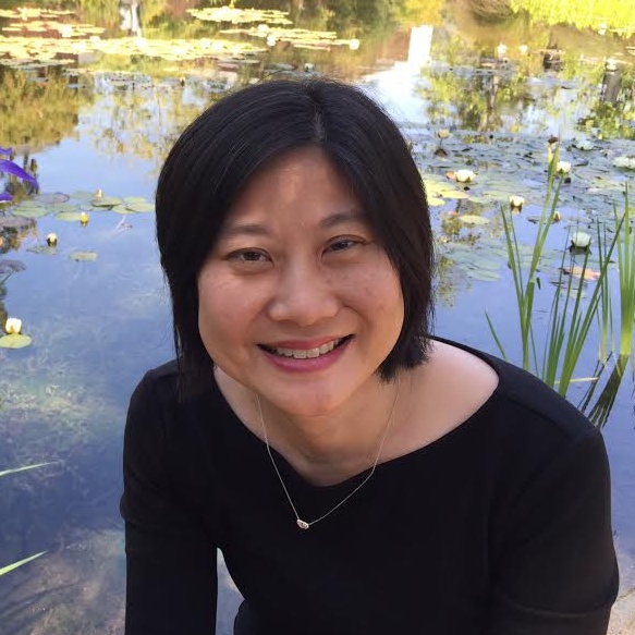 Julie Ha filmmaker headshot (with pond in background)