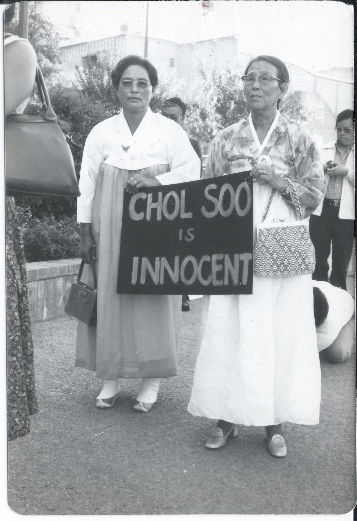 Supporters of Chol Soo Lee included elderly Korean immigrants, such as these two women wearing traditional Korean dresses as they demonstrated outside a Stockton, California, courthouse.
