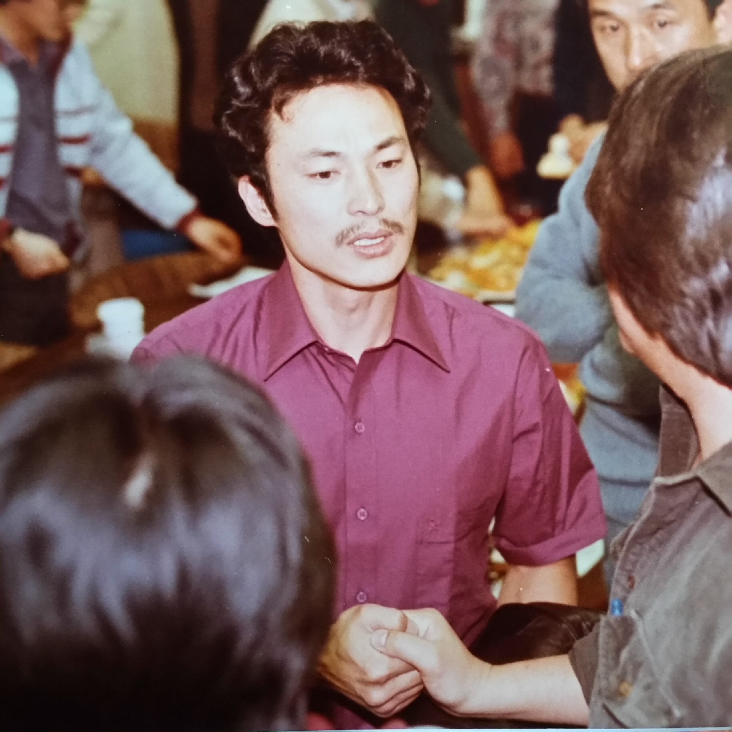 Chol Soo Lee, in red shirt, archival photo in color