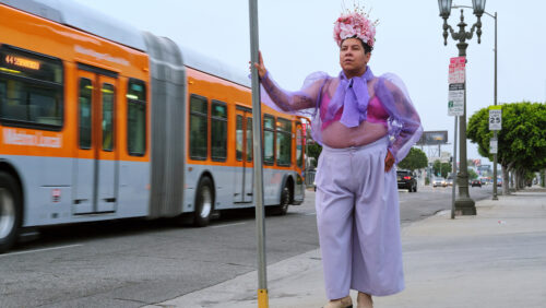 Man standing near bus