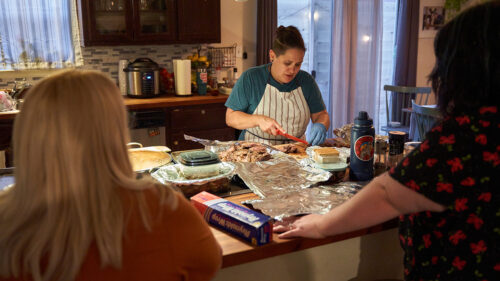 Women cooking in kitchen