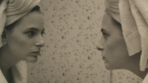 Marlee Matlin looking in mirror