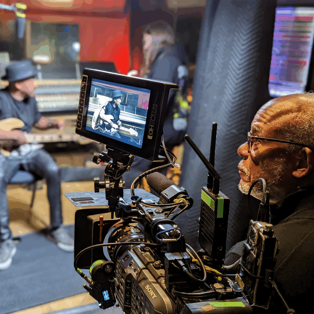 Stanley Nelson looking into camera in audio recording studio