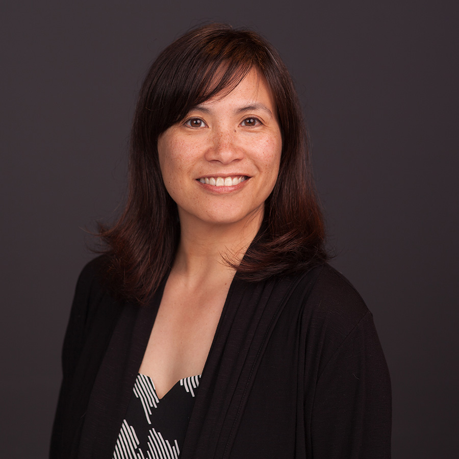 Headshot of woman with shoulder length brown hair and brown eyes